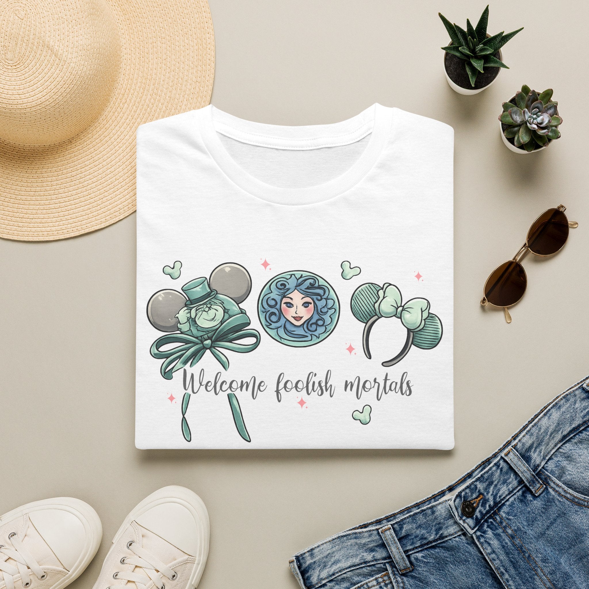 Welcome Foolish Mortals T‑Shirt — Cute Haunted Mansion Mouse Ear Design